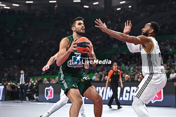 2024-10-30 - 77 Omer Yurtseven of Panathinaikos AKTOR Athens competing with 23 David Lighty of LDLC ASVEL Villeurbanne during the Euroleague, Round 6 match between Panathinaikos AKTOR Athens and LDLC ASVEL Villeurbanne at OAKA Altion Arena on October 30, 2024, Athens, Greece. - PANATHINAIKOS VS LDLC ASVEL VILLEURBANNE - EUROLEAGUE - BASKETBALL