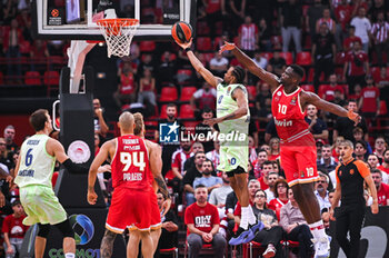 2024-10-31 - 0 Kevin Punter of FC Barcelona competing with 10 Moustapha Fall of Olympiacos Piraeus during the Euroleague, Round 7 match between Olympiacos Piraeus and FC Barcelona at Peace and Friendship Stadium in Piraeus, Greece, on October 31, 2024. - OLYMPIACOS VS FC BARCELONA - EUROLEAGUE - BASKETBALL