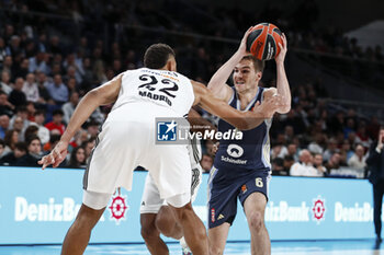 2024-11-21 - Malte Delow of Alba Berlin and Walter Samuel Tavares da Veiga of Real Madrid during the Turkish Airlines EuroLeague basketball match between Real Madrid and Alba Berlin on November 21, 2024 at Wizink Center in Madrid, Spain - BASKETBALL - EUROLEAGUE - REAL MADRID V ALBA BERLIN - EUROLEAGUE - BASKETBALL