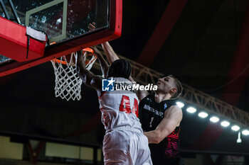 2024-01-24 - Gabe Brown #44 of Itelyum Varese dunks during FIBA Europe Cup 2023/24 Second Round Group N game between Itelyum Varese and Niners Chemnitz at Itelyum Arena, Varese, Italy on January 24, 2024 - ITELYUM VARESE VS NINERS CHEMNITZ - FIBA EUROPE CUP - BASKETBALL