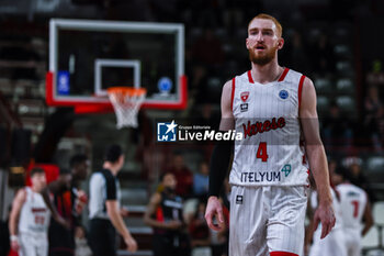 2024-01-24 - Niccolo Mannion #4  of Itelyum Varese looks on during FIBA Europe Cup 2023/24 Second Round Group N game between Itelyum Varese and Niners Chemnitz at Itelyum Arena, Varese, Italy on January 24, 2024 - ITELYUM VARESE VS NINERS CHEMNITZ - FIBA EUROPE CUP - BASKETBALL