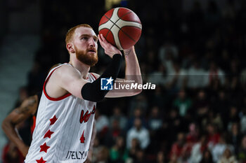 2024-01-24 - Niccolo Mannion #4  of Itelyum Varese seen in action during FIBA Europe Cup 2023/24 Second Round Group N game between Itelyum Varese and Niners Chemnitz at Itelyum Arena, Varese, Italy on January 24, 2024 - ITELYUM VARESE VS NINERS CHEMNITZ - FIBA EUROPE CUP - BASKETBALL