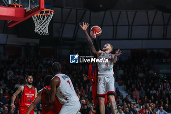 2024-03-27 - Niccolo Mannion #4 of Itelyum Varese (R) seen in action during FIBA Europe Cup 2023/24 Semi-Finals game between Itelyum Varese and Bahcesehir College at Itelyum Arena, Varese, Italy on March 27, 2024 - SEMIFINALS - ITELYUM VARESE BAHCESEHIR COLLEGE - FIBA EUROPE CUP - BASKETBALL