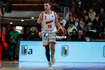 2024-03-27 - Hugo Besson #25 of Itelyum Varese seen in action during FIBA Europe Cup 2023/24 Semi-Finals game between Itelyum Varese and Bahcesehir College at Itelyum Arena, Varese, Italy on March 27, 2024 - SEMIFINALS - ITELYUM VARESE BAHCESEHIR COLLEGE - FIBA EUROPE CUP - BASKETBALL