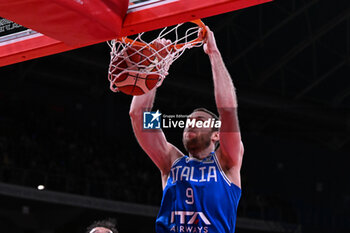 2024-02-22 - Tap-in of Nicolo Melli ( Italy ) during FIBA Euro Basket group B game between Italy and Turkiye  at Vitifrigo Arena in Pesaro, Italy on   February 22, 2024 - EUROBASKET 2025 QUALIFICATIONS - ITALY VS TURKEY - EVENTS - BASKETBALL