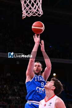 2024-02-22 - Sospension shot of Niccolo Melli ( Italy ) during FIBA Euro Basket group B game between Italy and Turkiye  at Vitifrigo Arena in Pesaro, Italy on   February 22, 2024 - EUROBASKET 2025 QUALIFICATIONS - ITALY VS TURKEY - EVENTS - BASKETBALL
