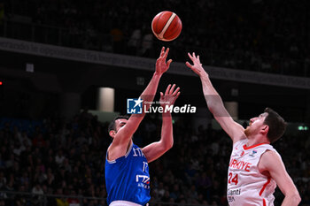 2024-02-22 - Sospensioin shot of Giampaolo Ricci ( Italy ) during FIBA Euro Basket group B game between Italy and Turkiye  at Vitifrigo Arena in Pesaro, Italy on   February 22, 2024 - EUROBASKET 2025 QUALIFICATIONS - ITALY VS TURKEY - EVENTS - BASKETBALL