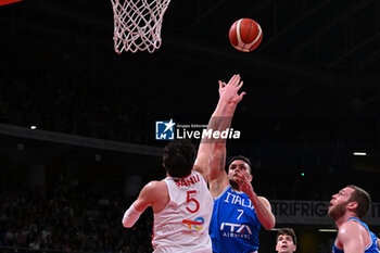 2024-02-22 - Sospension shot of Stefano Tonut ( Italy ) during FIBA Euro Basket group B game between Italy and Turkiye  at Vitifrigo Arena in Pesaro, Italy on   February 22, 2024 - EUROBASKET 2025 QUALIFICATIONS - ITALY VS TURKEY - EVENTS - BASKETBALL