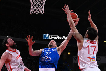 2024-02-22 - John Petruccelli ( Italy ) during FIBA Euro Basket group B game between Italy and Turkiye  at Vitifrigo Arena in Pesaro, Italy on   February 22, 2024 - EUROBASKET 2025 QUALIFICATIONS - ITALY VS TURKEY - EVENTS - BASKETBALL