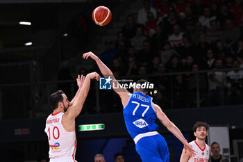 2024-02-22 - John Petruccelli ( Italy ) during FIBA Euro Basket group B game between Italy and Turkiye  at Vitifrigo Arena in Pesaro, Italy on   February 22, 2024 - EUROBASKET 2025 QUALIFICATIONS - ITALY VS TURKEY - EVENTS - BASKETBALL