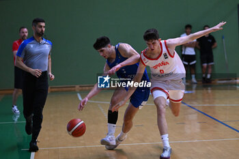 2024-07-05 - Images of the Spain and Greece match at Pala Cian Toma - Domegge (BL) 5 July, 2024, during the 22nd De Silvestro-Meneghin International U20 Basketball Tournament - TORNEO UNDER 20 - 22° MEMORIAL DE SILVESTRO/TROFEO MENEGHIN - SPAGNA VS GRECIA - EVENTS - BASKETBALL