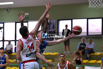 2024-07-05 - Images of the Spain and Greece match at Pala Cian Toma - Domegge (BL) 5 July, 2024, during the 22nd De Silvestro-Meneghin International U20 Basketball Tournament - TORNEO UNDER 20 - 22° MEMORIAL DE SILVESTRO/TROFEO MENEGHIN - SPAGNA VS GRECIA - EVENTS - BASKETBALL