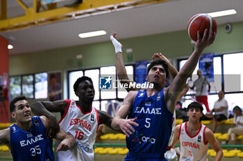 2024-07-05 - Images of the Spain and Greece match at Pala Cian Toma - Domegge (BL) 5 July, 2024, during the 22nd De Silvestro-Meneghin International U20 Basketball Tournament - TORNEO UNDER 20 - 22° MEMORIAL DE SILVESTRO/TROFEO MENEGHIN - SPAGNA VS GRECIA - EVENTS - BASKETBALL