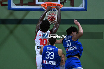 2024-07-05 - Images of the Spain and Greece match at Pala Cian Toma - Domegge (BL) 5 July, 2024, during the 22nd De Silvestro-Meneghin International U20 Basketball Tournament - TORNEO UNDER 20 - 22° MEMORIAL DE SILVESTRO/TROFEO MENEGHIN - SPAGNA VS GRECIA - EVENTS - BASKETBALL