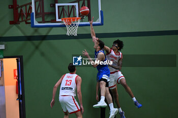 2024-07-05 - Images of the Spain and Greece match at Pala Cian Toma - Domegge (BL) 5 July, 2024, during the 22nd De Silvestro-Meneghin International U20 Basketball Tournament - TORNEO UNDER 20 - 22° MEMORIAL DE SILVESTRO/TROFEO MENEGHIN - SPAGNA VS GRECIA - EVENTS - BASKETBALL