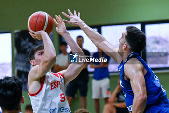 2024-07-05 - Images of the Spain and Greece match at Pala Cian Toma - Domegge (BL) 5 July, 2024, during the 22nd De Silvestro-Meneghin International U20 Basketball Tournament - TORNEO UNDER 20 - 22° MEMORIAL DE SILVESTRO/TROFEO MENEGHIN - SPAGNA VS GRECIA - EVENTS - BASKETBALL