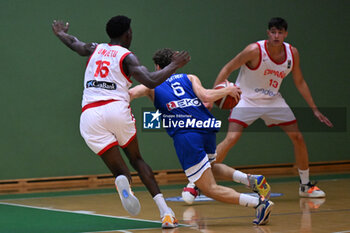 2024-07-05 - Images of the Spain and Greece match at Pala Cian Toma - Domegge (BL) 5 July, 2024, during the 22nd De Silvestro-Meneghin International U20 Basketball Tournament - TORNEO UNDER 20 - 22° MEMORIAL DE SILVESTRO/TROFEO MENEGHIN - SPAGNA VS GRECIA - EVENTS - BASKETBALL