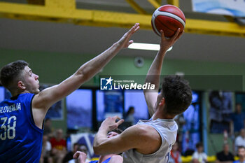 2024-07-05 - Actions of the game and players' images during the between Italy and Slovenia at Pala Cian Toma - Domegge (BL) 5 July, 2024 during the Torneo Under 20 - 22° Memorial De Silvestro/Trofeo Meneghin - TORNEO UNDER 20 - 22° MEMORIAL DE SILVESTRO/TROFEO MENEGHIN - ITALIA VS SLOVENIA - EVENTS - BASKETBALL