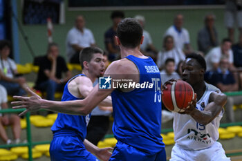 2024-07-05 - Actions of the game and players' images during the between Italy and Slovenia at Pala Cian Toma - Domegge (BL) 5 July, 2024 during the Torneo Under 20 - 22° Memorial De Silvestro/Trofeo Meneghin - TORNEO UNDER 20 - 22° MEMORIAL DE SILVESTRO/TROFEO MENEGHIN - ITALIA VS SLOVENIA - EVENTS - BASKETBALL