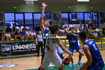 2024-07-05 - Actions of the game and players' images during the between Italy and Slovenia at Pala Cian Toma - Domegge (BL) 5 July, 2024 during the Torneo Under 20 - 22° Memorial De Silvestro/Trofeo Meneghin - TORNEO UNDER 20 - 22° MEMORIAL DE SILVESTRO/TROFEO MENEGHIN - ITALIA VS SLOVENIA - EVENTS - BASKETBALL