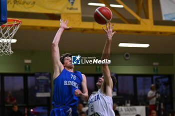 2024-07-05 - Actions of the game and players' images during the between Italy and Slovenia at Pala Cian Toma - Domegge (BL) 5 July, 2024 during the Torneo Under 20 - 22° Memorial De Silvestro/Trofeo Meneghin - TORNEO UNDER 20 - 22° MEMORIAL DE SILVESTRO/TROFEO MENEGHIN - ITALIA VS SLOVENIA - EVENTS - BASKETBALL