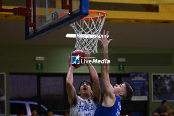 2024-07-05 - Actions of the game and players' images during the between Italy and Slovenia at Pala Cian Toma - Domegge (BL) 5 July, 2024 during the Torneo Under 20 - 22° Memorial De Silvestro/Trofeo Meneghin - TORNEO UNDER 20 - 22° MEMORIAL DE SILVESTRO/TROFEO MENEGHIN - ITALIA VS SLOVENIA - EVENTS - BASKETBALL