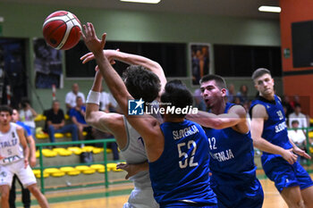 2024-07-05 - Actions of the game and players' images during the between Italy and Slovenia at Pala Cian Toma - Domegge (BL) 5 July, 2024 during the Torneo Under 20 - 22° Memorial De Silvestro/Trofeo Meneghin - TORNEO UNDER 20 - 22° MEMORIAL DE SILVESTRO/TROFEO MENEGHIN - ITALIA VS SLOVENIA - EVENTS - BASKETBALL