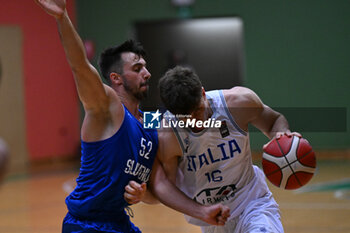 2024-07-05 - Actions of the game and players' images during the between Italy and Slovenia at Pala Cian Toma - Domegge (BL) 5 July, 2024 during the Torneo Under 20 - 22° Memorial De Silvestro/Trofeo Meneghin - TORNEO UNDER 20 - 22° MEMORIAL DE SILVESTRO/TROFEO MENEGHIN - ITALIA VS SLOVENIA - EVENTS - BASKETBALL