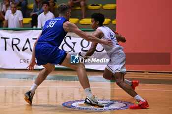 2024-07-05 - Actions of the game and players' images during the between Italy and Slovenia at Pala Cian Toma - Domegge (BL) 5 July, 2024 during the Torneo Under 20 - 22° Memorial De Silvestro/Trofeo Meneghin - TORNEO UNDER 20 - 22° MEMORIAL DE SILVESTRO/TROFEO MENEGHIN - ITALIA VS SLOVENIA - EVENTS - BASKETBALL