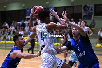 2024-07-05 - Actions of the game and players' images during the between Italy and Slovenia at Pala Cian Toma - Domegge (BL) 5 July, 2024 during the Torneo Under 20 - 22° Memorial De Silvestro/Trofeo Meneghin - TORNEO UNDER 20 - 22° MEMORIAL DE SILVESTRO/TROFEO MENEGHIN - ITALIA VS SLOVENIA - EVENTS - BASKETBALL