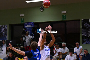 2024-07-05 - Actions of the game and players' images during the between Italy and Slovenia at Pala Cian Toma - Domegge (BL) 5 July, 2024 during the Torneo Under 20 - 22° Memorial De Silvestro/Trofeo Meneghin - TORNEO UNDER 20 - 22° MEMORIAL DE SILVESTRO/TROFEO MENEGHIN - ITALIA VS SLOVENIA - EVENTS - BASKETBALL