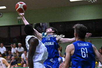 2024-07-05 - Actions of the game and players' images during the between Italy and Slovenia at Pala Cian Toma - Domegge (BL) 5 July, 2024 during the Torneo Under 20 - 22° Memorial De Silvestro/Trofeo Meneghin - TORNEO UNDER 20 - 22° MEMORIAL DE SILVESTRO/TROFEO MENEGHIN - ITALIA VS SLOVENIA - EVENTS - BASKETBALL