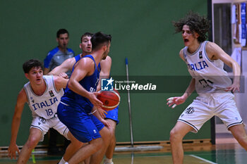 2024-07-05 - Actions of the game and players' images during the between Italy and Slovenia at Pala Cian Toma - Domegge (BL) 5 July, 2024 during the Torneo Under 20 - 22° Memorial De Silvestro/Trofeo Meneghin - TORNEO UNDER 20 - 22° MEMORIAL DE SILVESTRO/TROFEO MENEGHIN - ITALIA VS SLOVENIA - EVENTS - BASKETBALL