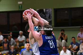 2024-07-05 - Actions of the game and players' images during the between Italy and Slovenia at Pala Cian Toma - Domegge (BL) 5 July, 2024 during the Torneo Under 20 - 22° Memorial De Silvestro/Trofeo Meneghin - TORNEO UNDER 20 - 22° MEMORIAL DE SILVESTRO/TROFEO MENEGHIN - ITALIA VS SLOVENIA - EVENTS - BASKETBALL