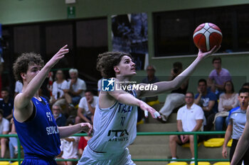 2024-07-05 - Actions of the game and players' images during the between Italy and Slovenia at Pala Cian Toma - Domegge (BL) 5 July, 2024 during the Torneo Under 20 - 22° Memorial De Silvestro/Trofeo Meneghin - TORNEO UNDER 20 - 22° MEMORIAL DE SILVESTRO/TROFEO MENEGHIN - ITALIA VS SLOVENIA - EVENTS - BASKETBALL