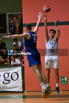 2024-07-05 - Actions of the game and players' images during the between Italy and Slovenia at Pala Cian Toma - Domegge (BL) 5 July, 2024 during the Torneo Under 20 - 22° Memorial De Silvestro/Trofeo Meneghin - TORNEO UNDER 20 - 22° MEMORIAL DE SILVESTRO/TROFEO MENEGHIN - ITALIA VS SLOVENIA - EVENTS - BASKETBALL