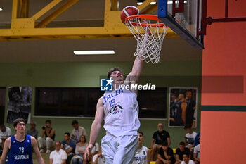 2024-07-05 - Actions of the game and players' images during the between Italy and Slovenia at Pala Cian Toma - Domegge (BL) 5 July, 2024 during the Torneo Under 20 - 22° Memorial De Silvestro/Trofeo Meneghin - TORNEO UNDER 20 - 22° MEMORIAL DE SILVESTRO/TROFEO MENEGHIN - ITALIA VS SLOVENIA - EVENTS - BASKETBALL