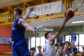 2024-07-06 - Actions of the game and players' images during the between Greece and Slovenija at Pala Cian Toma - Domegge (BL) 6 July, 2024 during the Torneo Under 20 - 22° Memorial De Silvestro/Trofeo Meneghin - TORNEO UNDER 20 - 22° MEMORIAL DE SILVESTRO/TROFEO MENEGHIN - GRECIA VS SLOVENIA - EVENTS - BASKETBALL