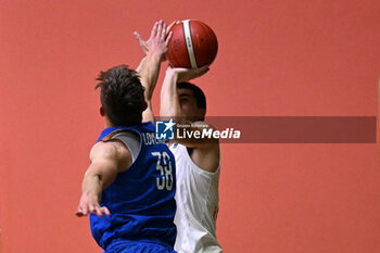 2024-07-06 - Actions of the game and players' images during the between Greece and Slovenija at Pala Cian Toma - Domegge (BL) 6 July, 2024 during the Torneo Under 20 - 22° Memorial De Silvestro/Trofeo Meneghin - TORNEO UNDER 20 - 22° MEMORIAL DE SILVESTRO/TROFEO MENEGHIN - GRECIA VS SLOVENIA - EVENTS - BASKETBALL