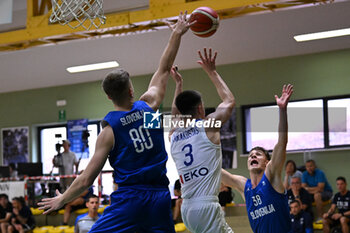 2024-07-06 - Actions of the game and players' images during the between Greece and Slovenija at Pala Cian Toma - Domegge (BL) 6 July, 2024 during the Torneo Under 20 - 22° Memorial De Silvestro/Trofeo Meneghin - TORNEO UNDER 20 - 22° MEMORIAL DE SILVESTRO/TROFEO MENEGHIN - GRECIA VS SLOVENIA - EVENTS - BASKETBALL