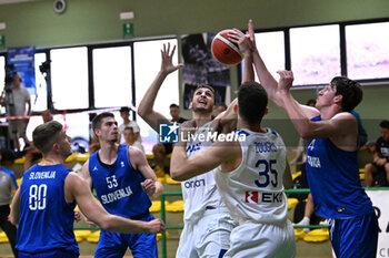 2024-07-06 - Actions of the game and players' images during the between Greece and Slovenija at Pala Cian Toma - Domegge (BL) 6 July, 2024 during the Torneo Under 20 - 22° Memorial De Silvestro/Trofeo Meneghin - TORNEO UNDER 20 - 22° MEMORIAL DE SILVESTRO/TROFEO MENEGHIN - GRECIA VS SLOVENIA - EVENTS - BASKETBALL