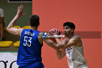 2024-07-06 - Actions of the game and players' images during the between Greece and Slovenija at Pala Cian Toma - Domegge (BL) 6 July, 2024 during the Torneo Under 20 - 22° Memorial De Silvestro/Trofeo Meneghin - TORNEO UNDER 20 - 22° MEMORIAL DE SILVESTRO/TROFEO MENEGHIN - GRECIA VS SLOVENIA - EVENTS - BASKETBALL