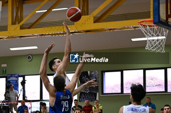 2024-07-06 - Actions of the game and players' images during the between Greece and Slovenija at Pala Cian Toma - Domegge (BL) 6 July, 2024 during the Torneo Under 20 - 22° Memorial De Silvestro/Trofeo Meneghin - TORNEO UNDER 20 - 22° MEMORIAL DE SILVESTRO/TROFEO MENEGHIN - GRECIA VS SLOVENIA - EVENTS - BASKETBALL