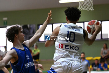 2024-07-06 - Actions of the game and players' images during the between Greece and Slovenija at Pala Cian Toma - Domegge (BL) 6 July, 2024 during the Torneo Under 20 - 22° Memorial De Silvestro/Trofeo Meneghin - TORNEO UNDER 20 - 22° MEMORIAL DE SILVESTRO/TROFEO MENEGHIN - GRECIA VS SLOVENIA - EVENTS - BASKETBALL