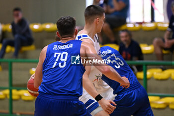 2024-07-06 - Actions of the game and players' images during the between Greece and Slovenija at Pala Cian Toma - Domegge (BL) 6 July, 2024 during the Torneo Under 20 - 22° Memorial De Silvestro/Trofeo Meneghin - TORNEO UNDER 20 - 22° MEMORIAL DE SILVESTRO/TROFEO MENEGHIN - GRECIA VS SLOVENIA - EVENTS - BASKETBALL