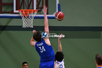 2024-07-06 - Actions of the game and players' images during the between Greece and Slovenija at Pala Cian Toma - Domegge (BL) 6 July, 2024 during the Torneo Under 20 - 22° Memorial De Silvestro/Trofeo Meneghin - TORNEO UNDER 20 - 22° MEMORIAL DE SILVESTRO/TROFEO MENEGHIN - GRECIA VS SLOVENIA - EVENTS - BASKETBALL