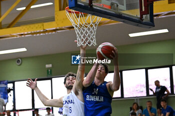 2024-07-06 - Actions of the game and players' images during the between Greece and Slovenija at Pala Cian Toma - Domegge (BL) 6 July, 2024 during the Torneo Under 20 - 22° Memorial De Silvestro/Trofeo Meneghin - TORNEO UNDER 20 - 22° MEMORIAL DE SILVESTRO/TROFEO MENEGHIN - GRECIA VS SLOVENIA - EVENTS - BASKETBALL