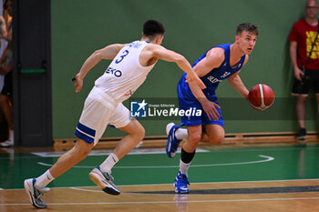 2024-07-06 - Actions of the game and players' images during the between Greece and Slovenija at Pala Cian Toma - Domegge (BL) 6 July, 2024 during the Torneo Under 20 - 22° Memorial De Silvestro/Trofeo Meneghin - TORNEO UNDER 20 - 22° MEMORIAL DE SILVESTRO/TROFEO MENEGHIN - GRECIA VS SLOVENIA - EVENTS - BASKETBALL