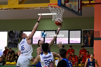 2024-07-06 - Actions of the game and players' images during the between Greece and Slovenija at Pala Cian Toma - Domegge (BL) 6 July, 2024 during the Torneo Under 20 - 22° Memorial De Silvestro/Trofeo Meneghin - TORNEO UNDER 20 - 22° MEMORIAL DE SILVESTRO/TROFEO MENEGHIN - GRECIA VS SLOVENIA - EVENTS - BASKETBALL