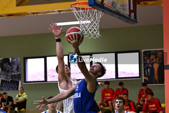 2024-07-06 - Actions of the game and players' images during the between Greece and Slovenija at Pala Cian Toma - Domegge (BL) 6 July, 2024 during the Torneo Under 20 - 22° Memorial De Silvestro/Trofeo Meneghin - TORNEO UNDER 20 - 22° MEMORIAL DE SILVESTRO/TROFEO MENEGHIN - GRECIA VS SLOVENIA - EVENTS - BASKETBALL